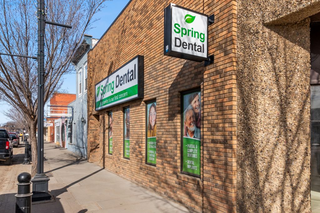 spring dental wetaskiwin logo